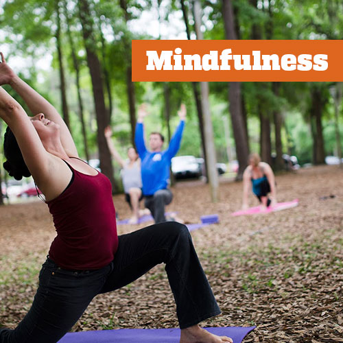 photo of students doing yoga